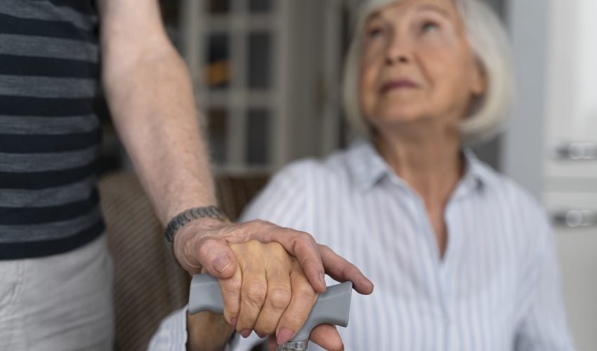 elderly-woman-looking-her-caregiver